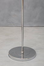 Metal stand on a grey background