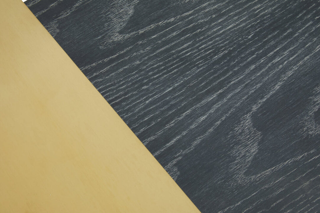 Close up pf gold and black wooden finish