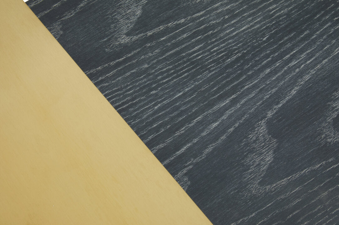 Close up pf gold and black wooden finish