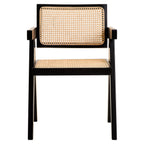 Chair with black frame and woven cane seat and backrest on a white background