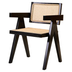 Chair with black frame and woven seat and backrest on a white background