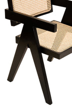 Black chair with woven cane seat and backrest on a white background