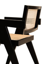 Black chair with woven seat and backrest on a white background