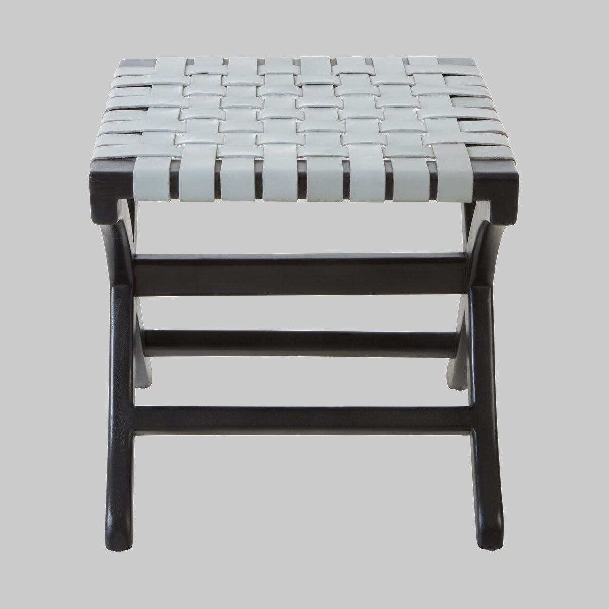 Stool with woven seat and black frame on a gray background