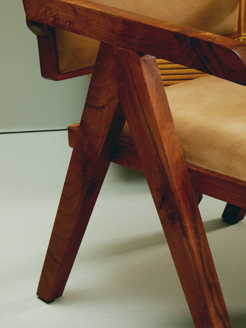 Close up of brown wooden leather chair