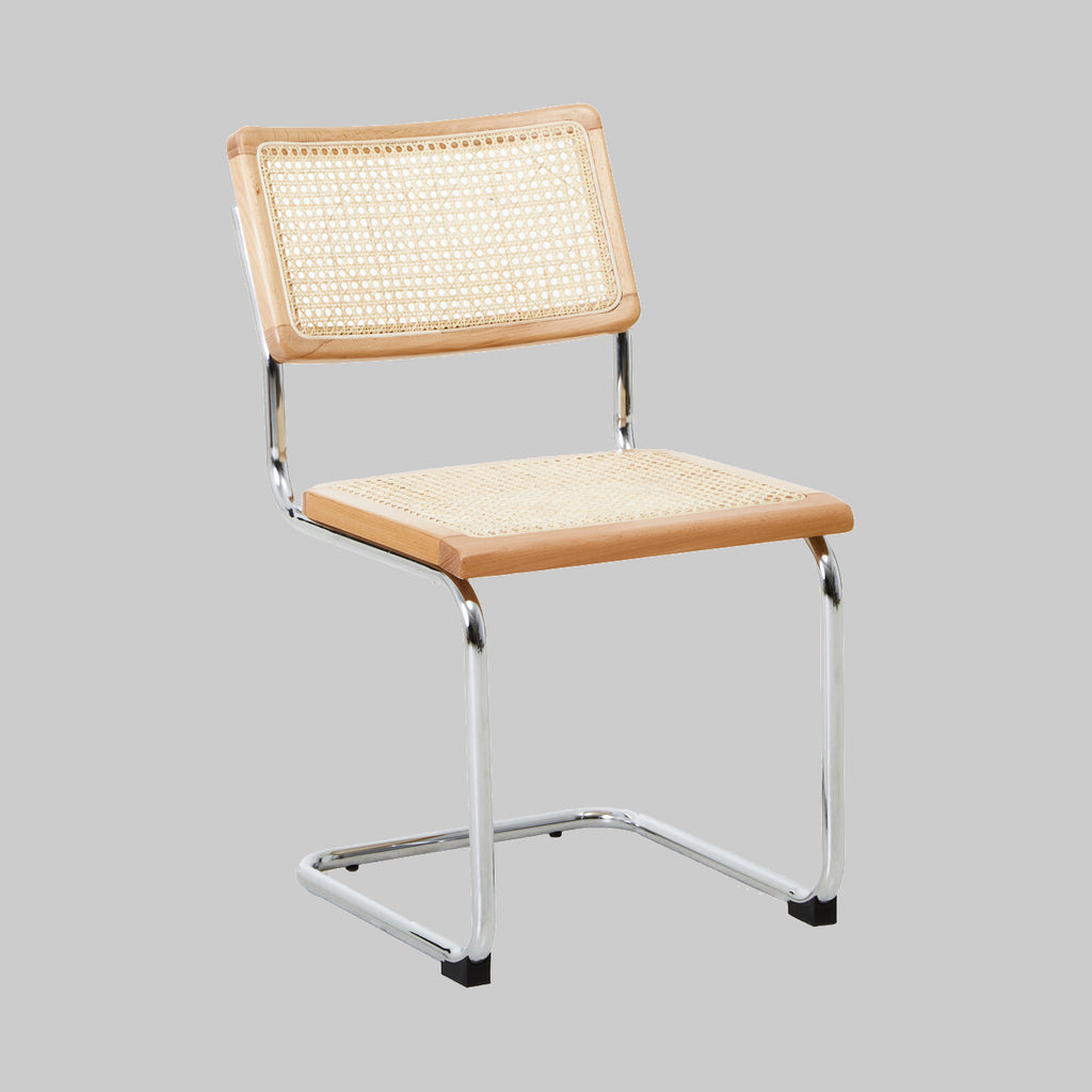 Cesca-like Cantilever Rattan Dining Chair on grey background