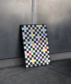 Checkmate Poster in black frame leaning on wall