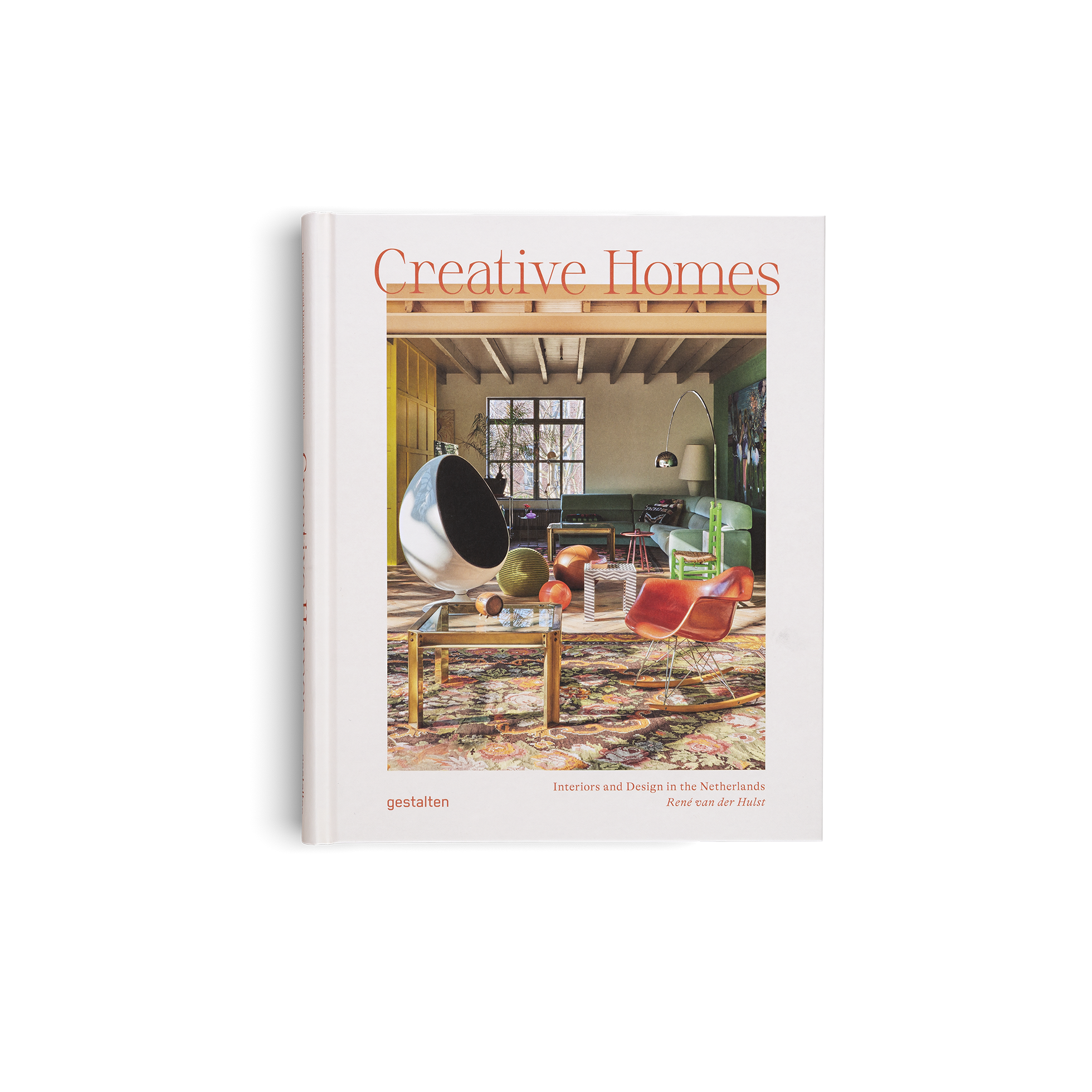 Book titled 'Creative Homes' with an interior design image on the cover.