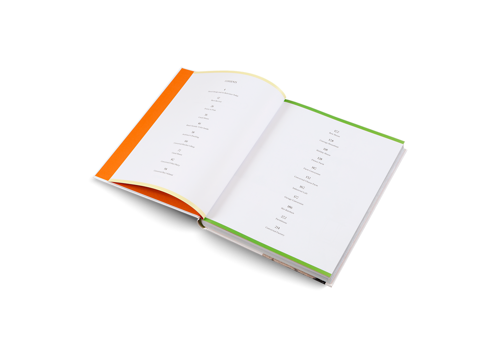 Open book with orange and green edges on a white background