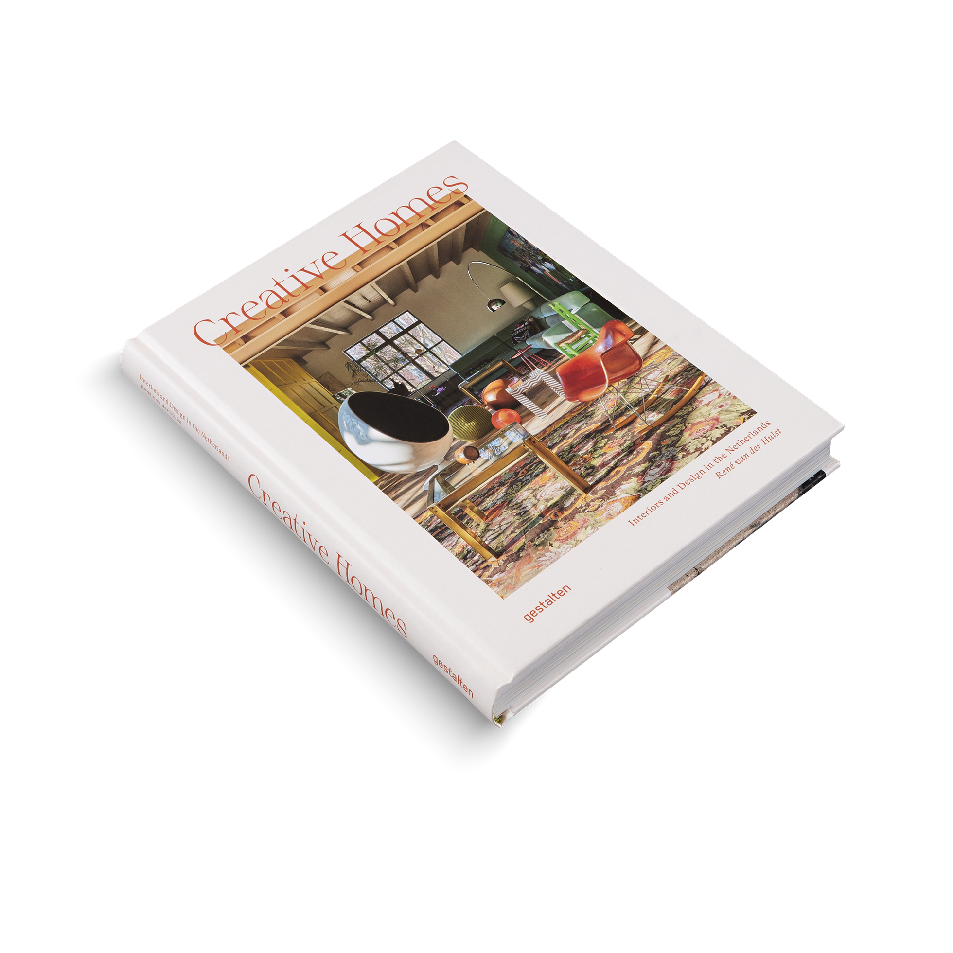 Book titled 'Creative Homes' on a white background
