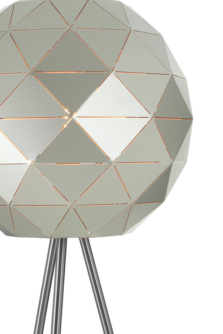 Geometrically designed lamp with metallic legs on a white background