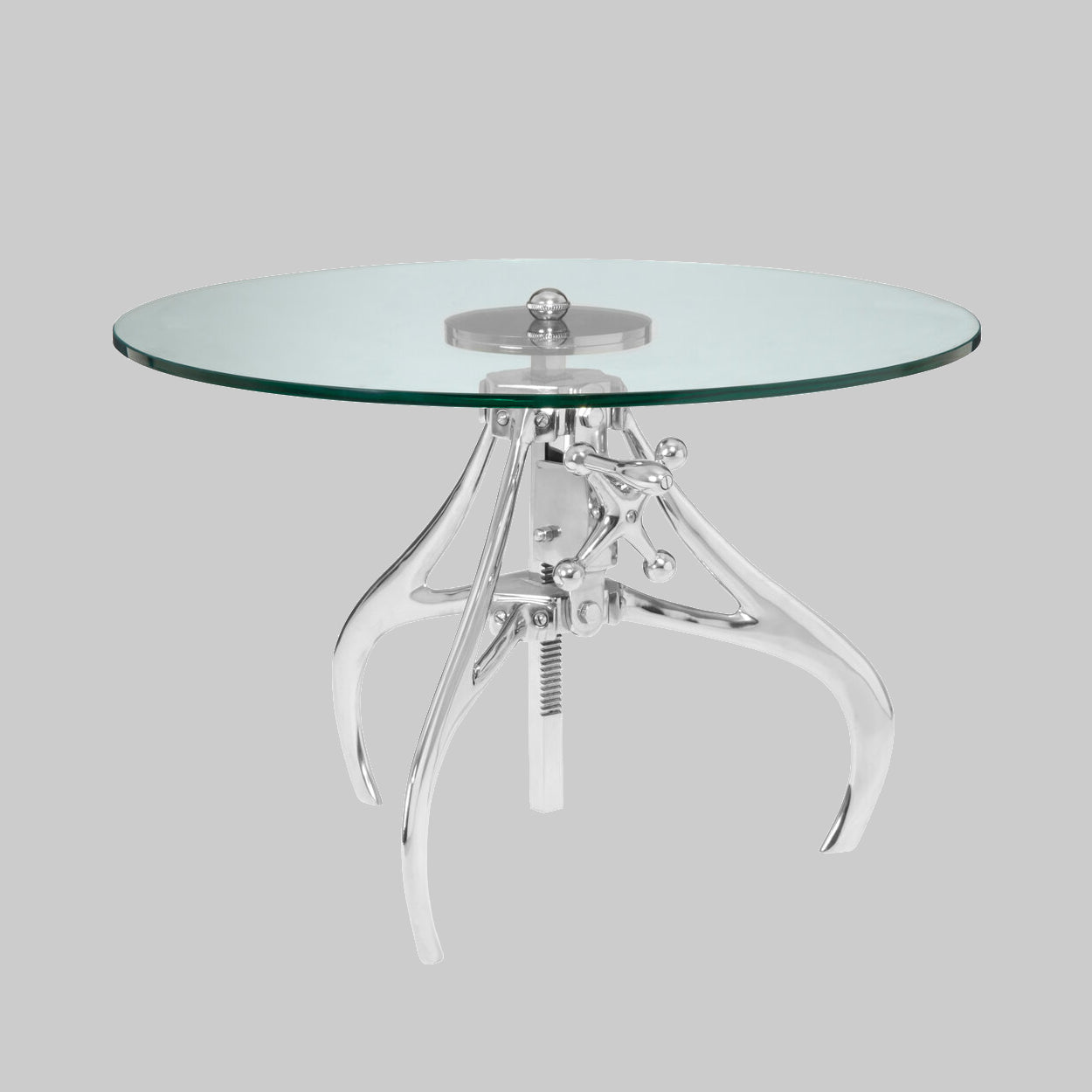 Glass table with a transparent metal base on a gray background