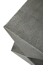 Grey honeycomb metal stool on a white background