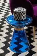 Blue Glass Martini Side Table on geometric rug with box on top