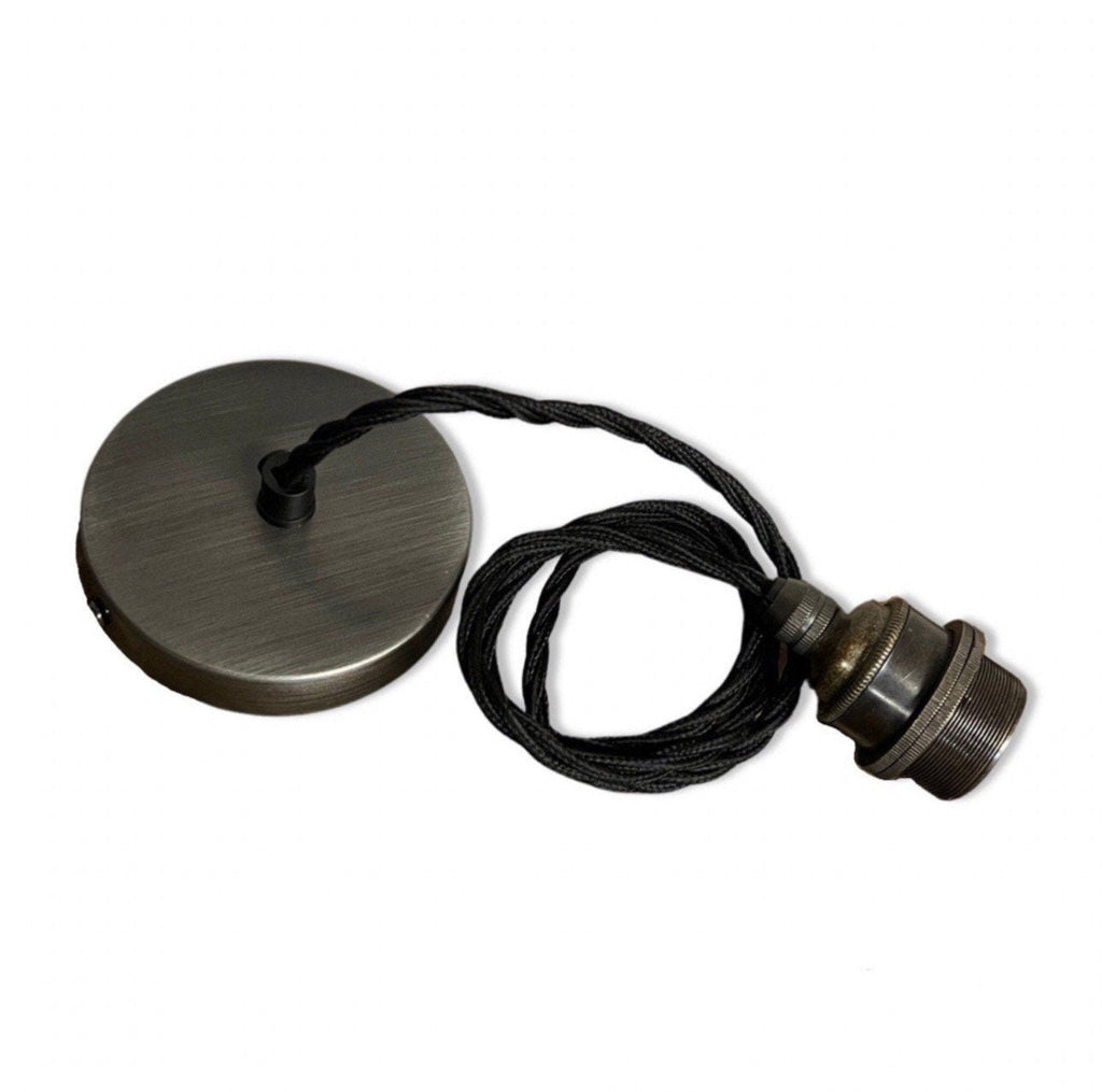 Metallic disc with a cord and fitting on a white background