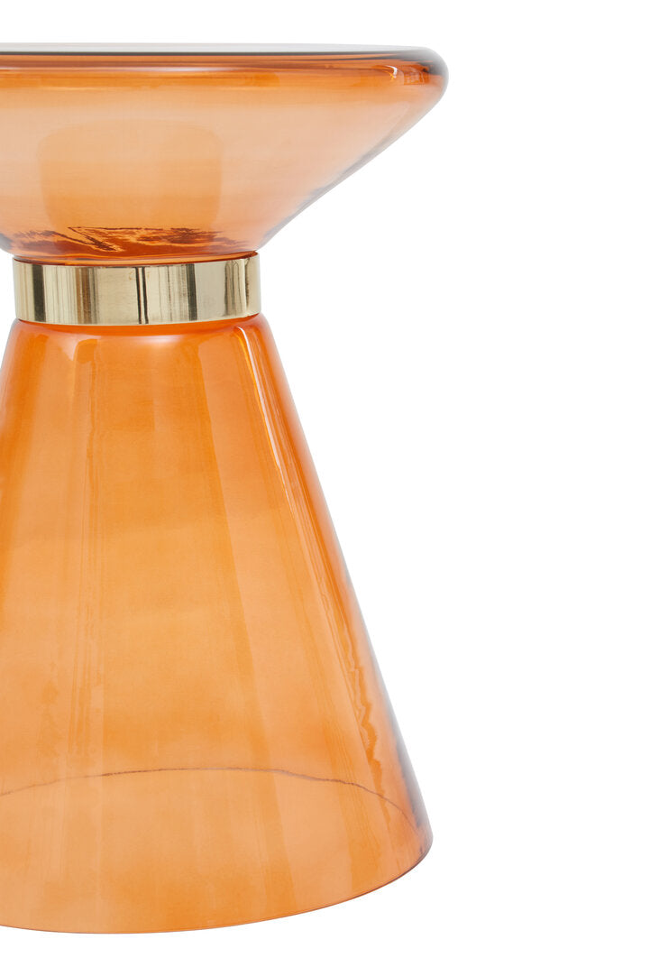 Orange glass side table with gold accent on a white background