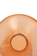 Close-up of an orange glass bowl on a white background