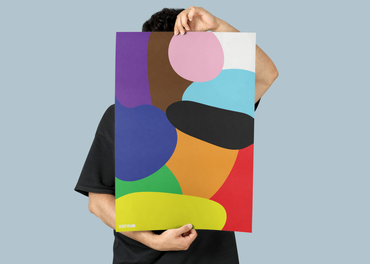 Person holding A2 Humanity Rainbow Poster