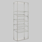 Metal shelving unit with multiple shelves on a gray background