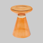 Orange side table with a gold accent on a gray background