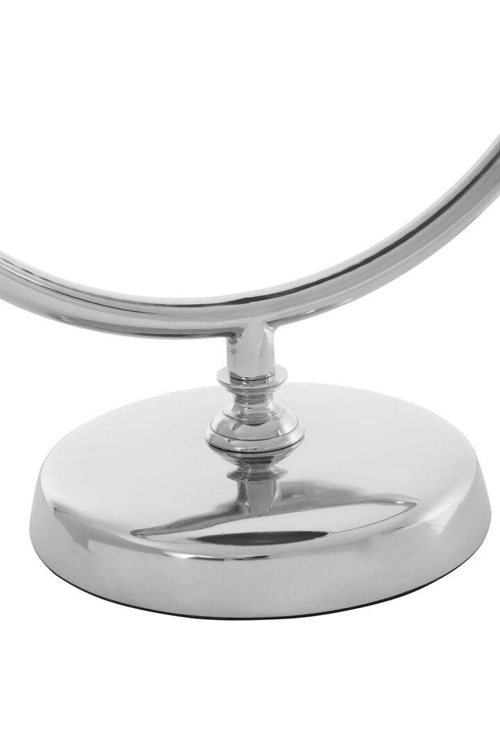 Chrome circular lamp on a white background