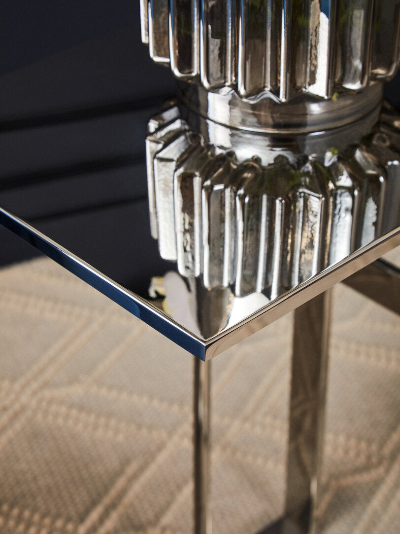 Close-up of a metallic table with polished surface