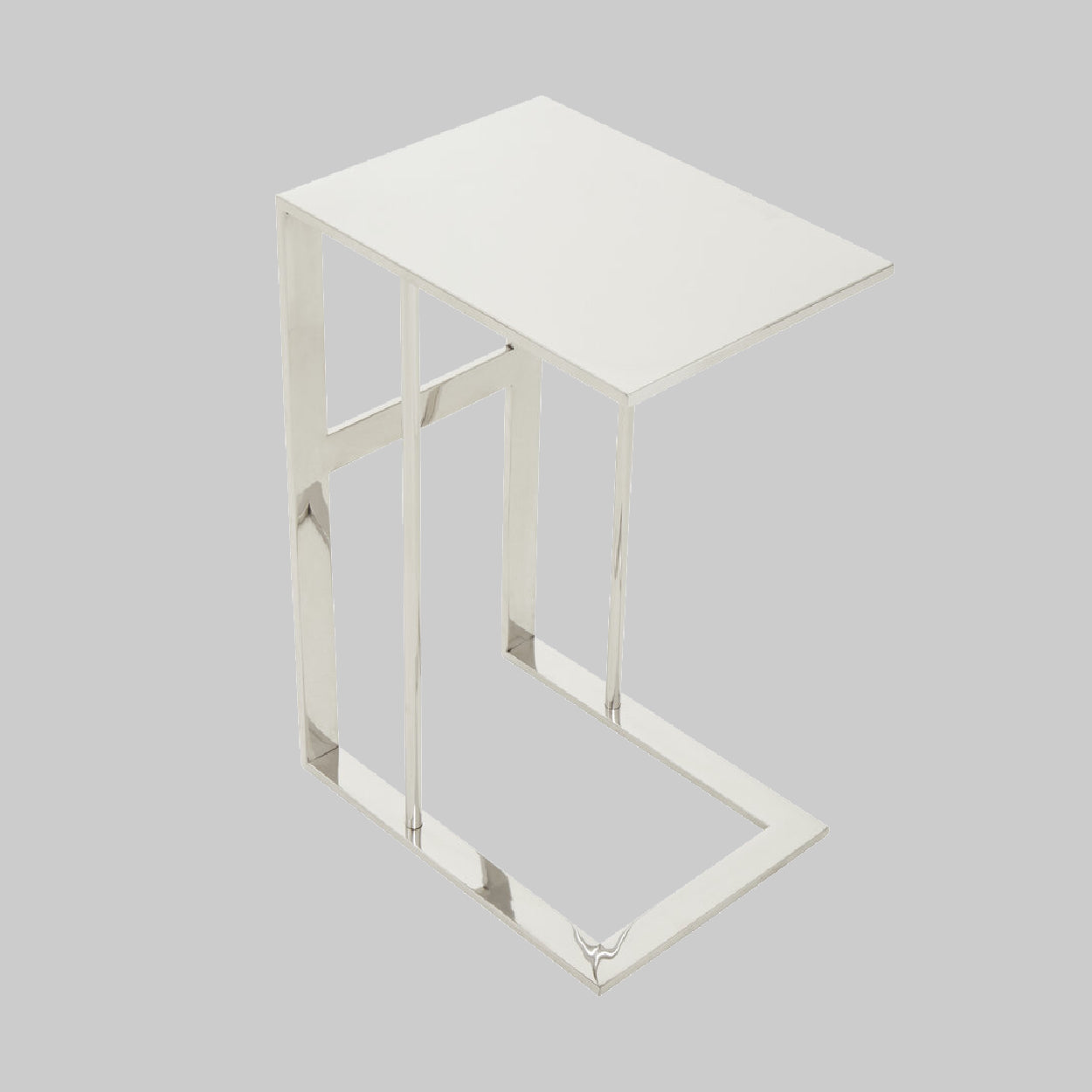 Silver U-shaped Side Table on grey background