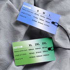 Clothing labels showing sizes for T-Shirts
