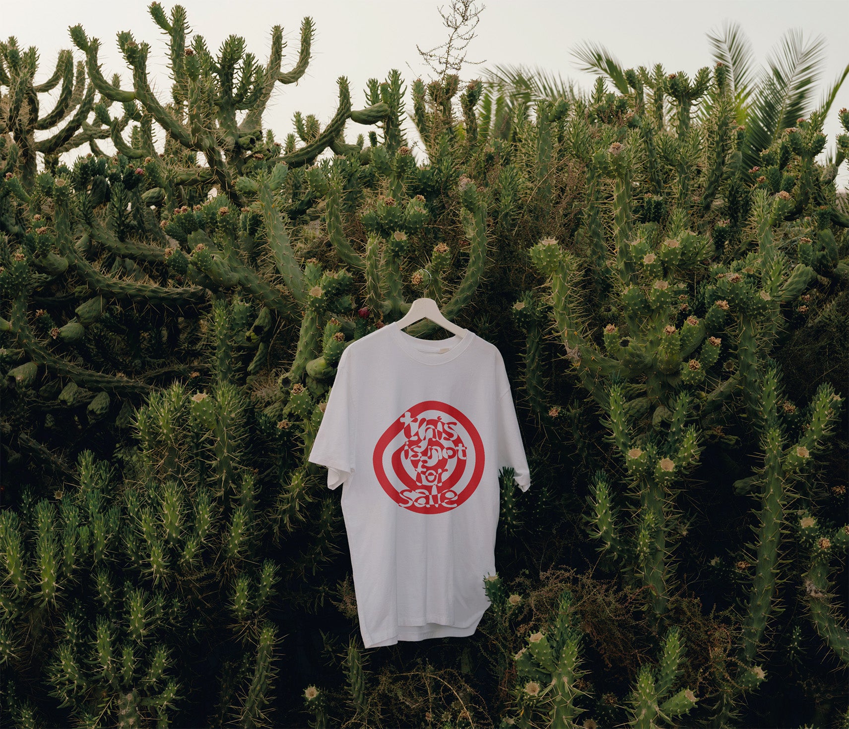 White T-Shirt with red This is not for sale artwork by Kefino