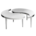 Two modern round tables with chrome legs on a white background